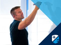 Teacher Dave Lewis in front of whiteboard